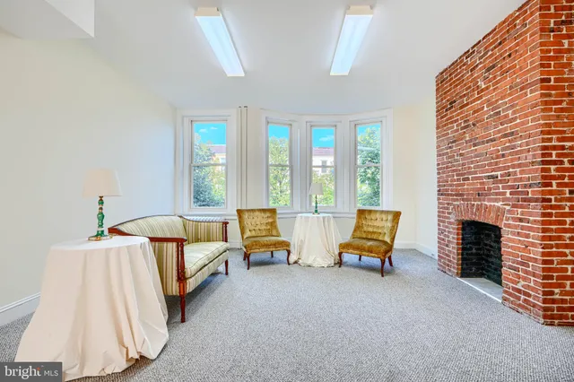 a bedroom with furniture and a couch