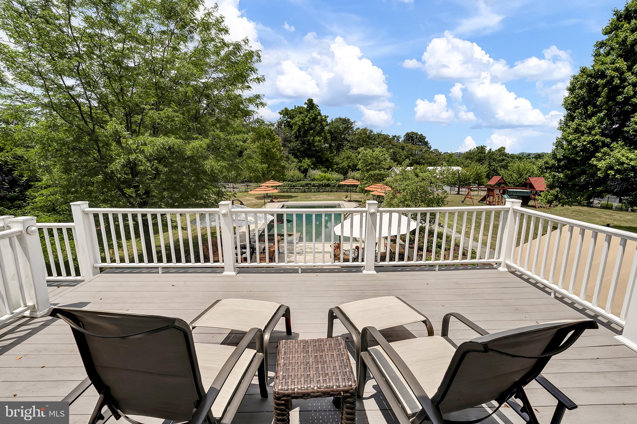 26100 Mullinix Mill Road Mount Airy, MD 21771 - Photo 37 of 99 Serene Deck Overlooking a Pool Oasis
