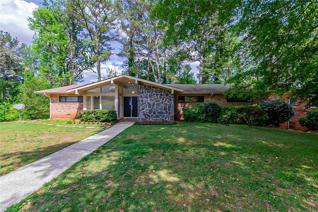2286 Springside Way Decatur, GA 30032 - Photo 1 of 1 a view of a house with backyard and garden