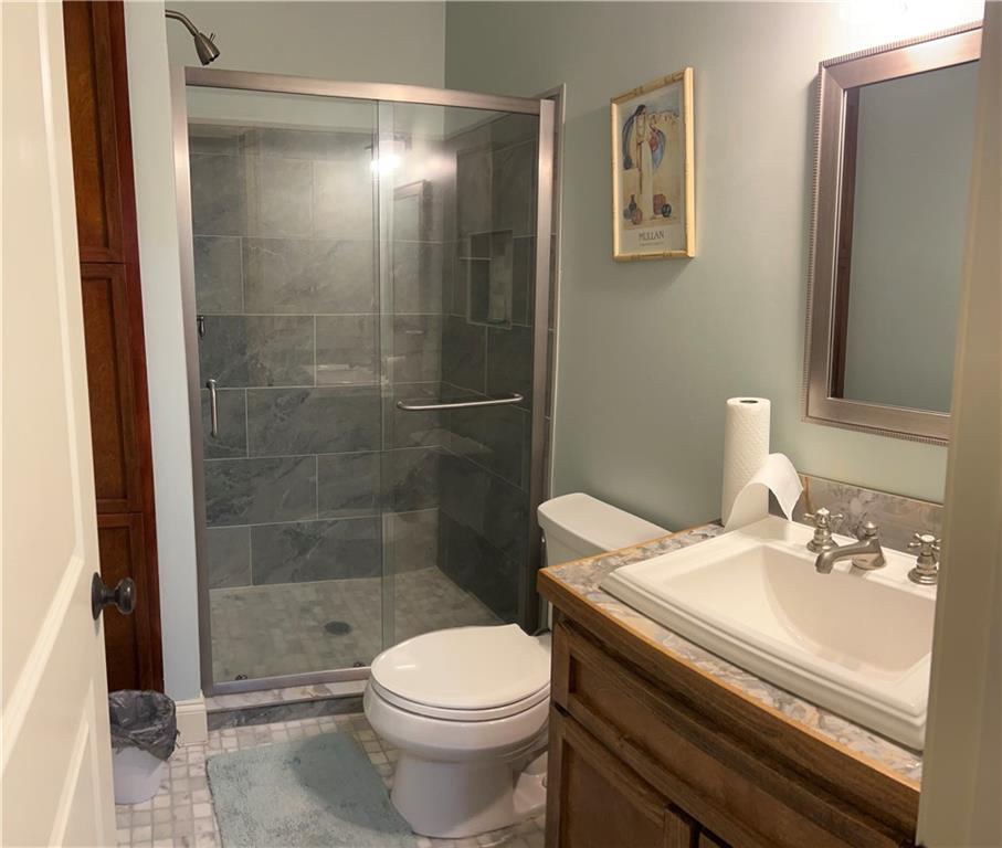 731 Jenni Lane Manchester, GA 31816 - Photo 7 of 11 a bathroom with a sink toilet and shower