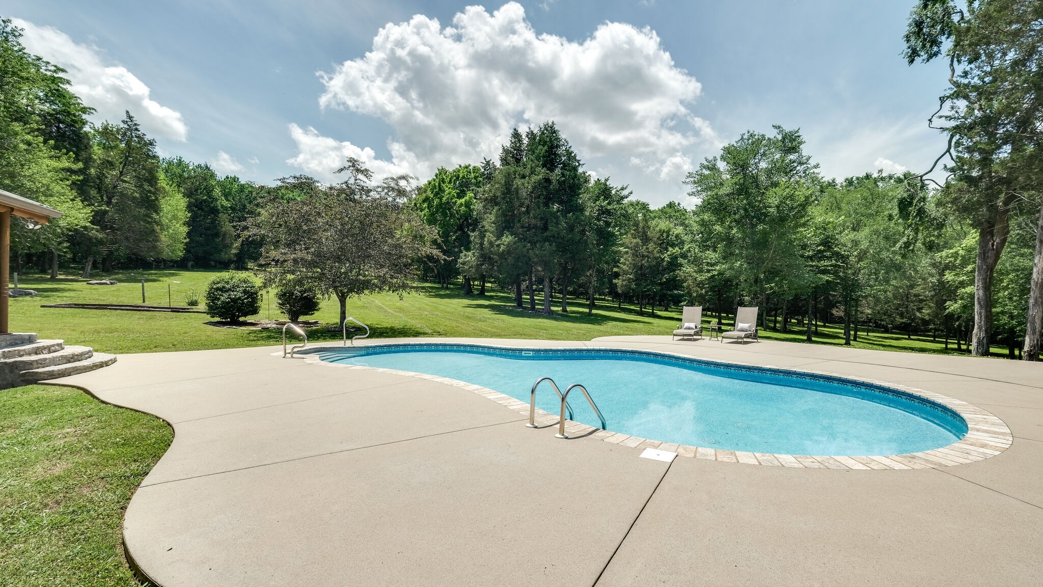 618 Greenvale Road Lebanon, TN 37090 - Photo 32 of 48 a view of a swimming pool and a yard