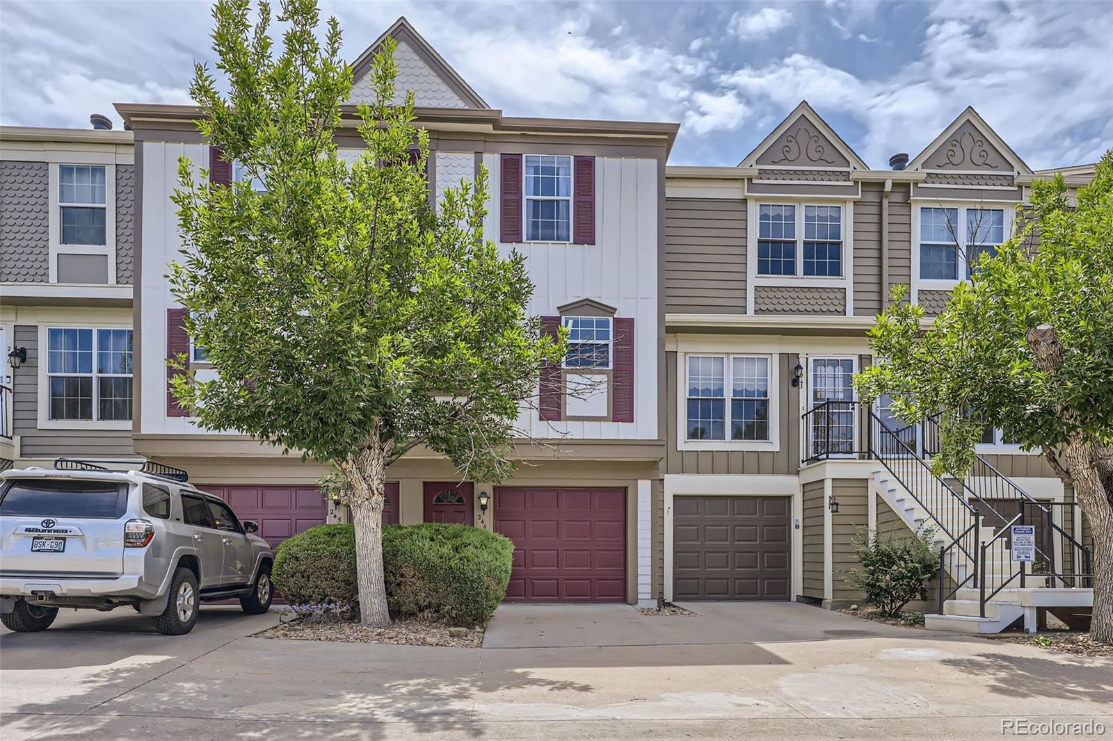 a view of a car park in front of house