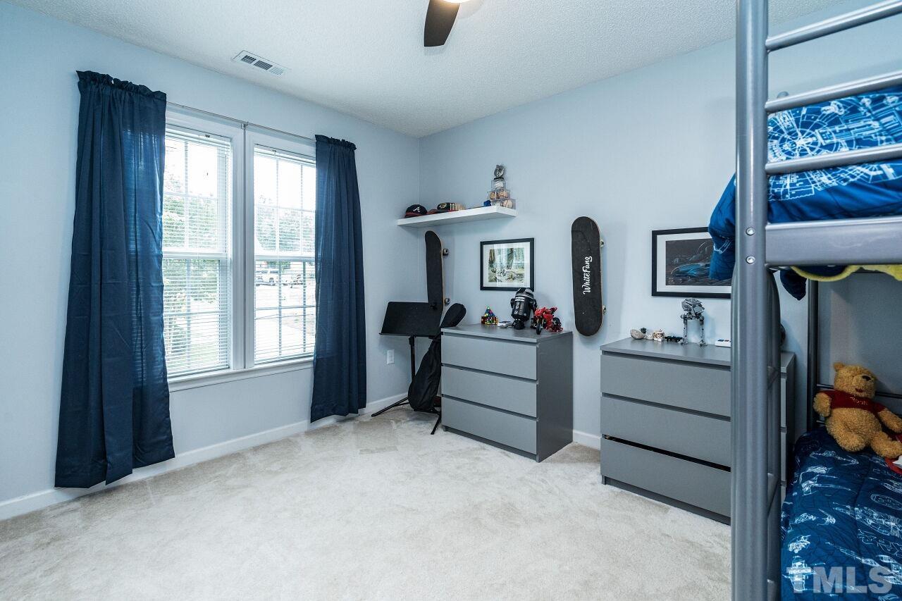 1037 Red Brick Road Garner, NC 27529 - Photo 20 of 33 a room with furniture and window