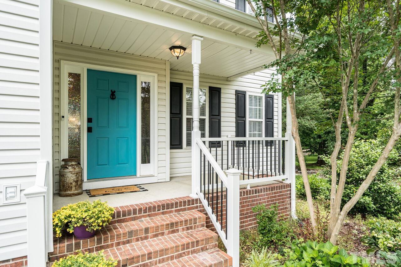 1037 Red Brick Road Garner, NC 27529 - Photo 2 of 33 front view of a house with a porch