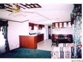 5000 Ontario Road Keysville, VA 23947 - Photo 3 of 10 a view of kitchen with furniture and a fireplace