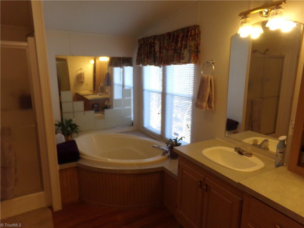 4806 Cashatt Road Trinity, NC 27370 - Photo 13 of 30 Glamour Bath with Deep Oval Tub and Separate Shower & double vanity.
