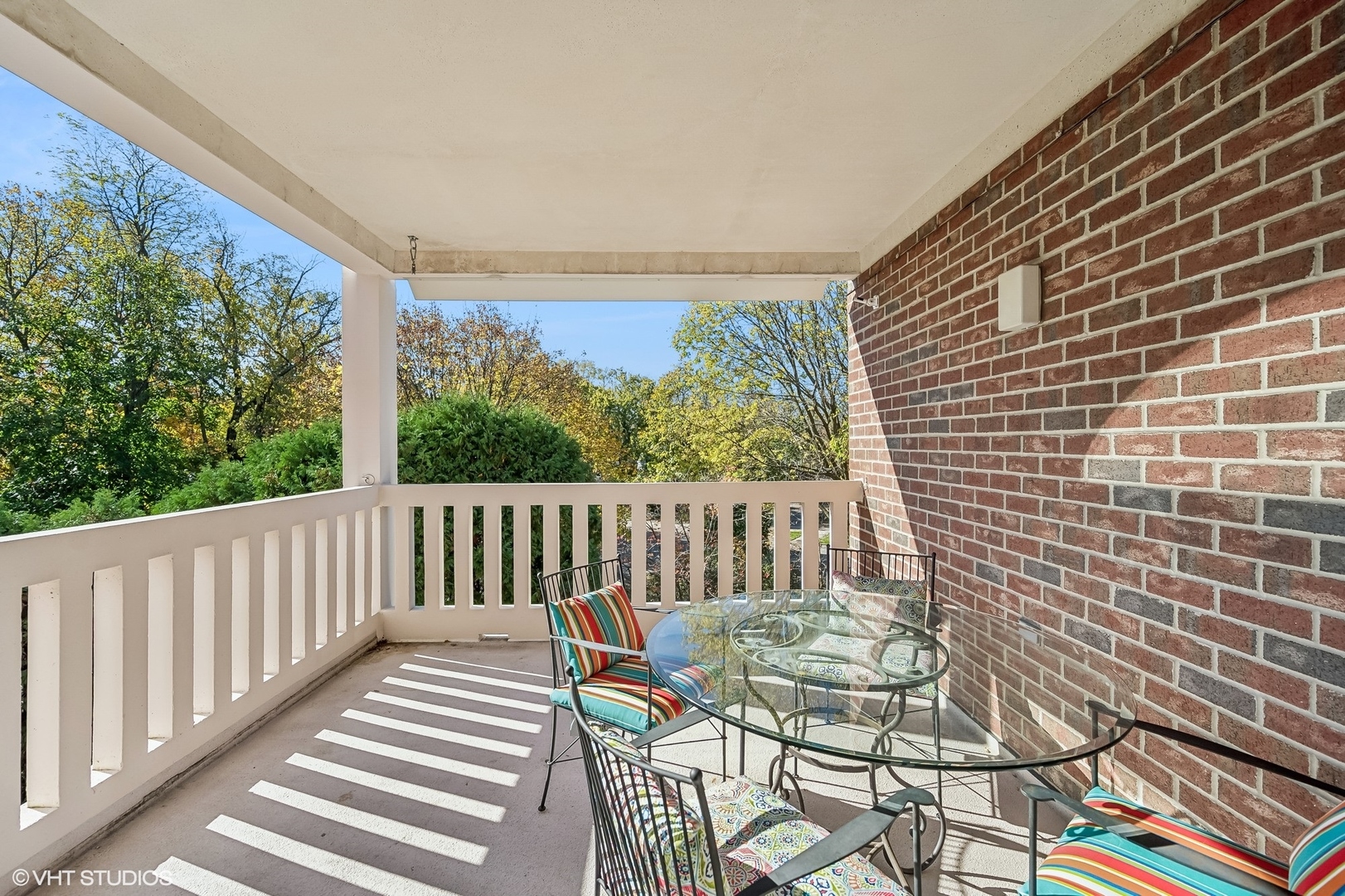 360 Green Bay Road, Unit 3D Winnetka, IL 60093 - Photo 17 of 30 a view of a chairs and table on the deck