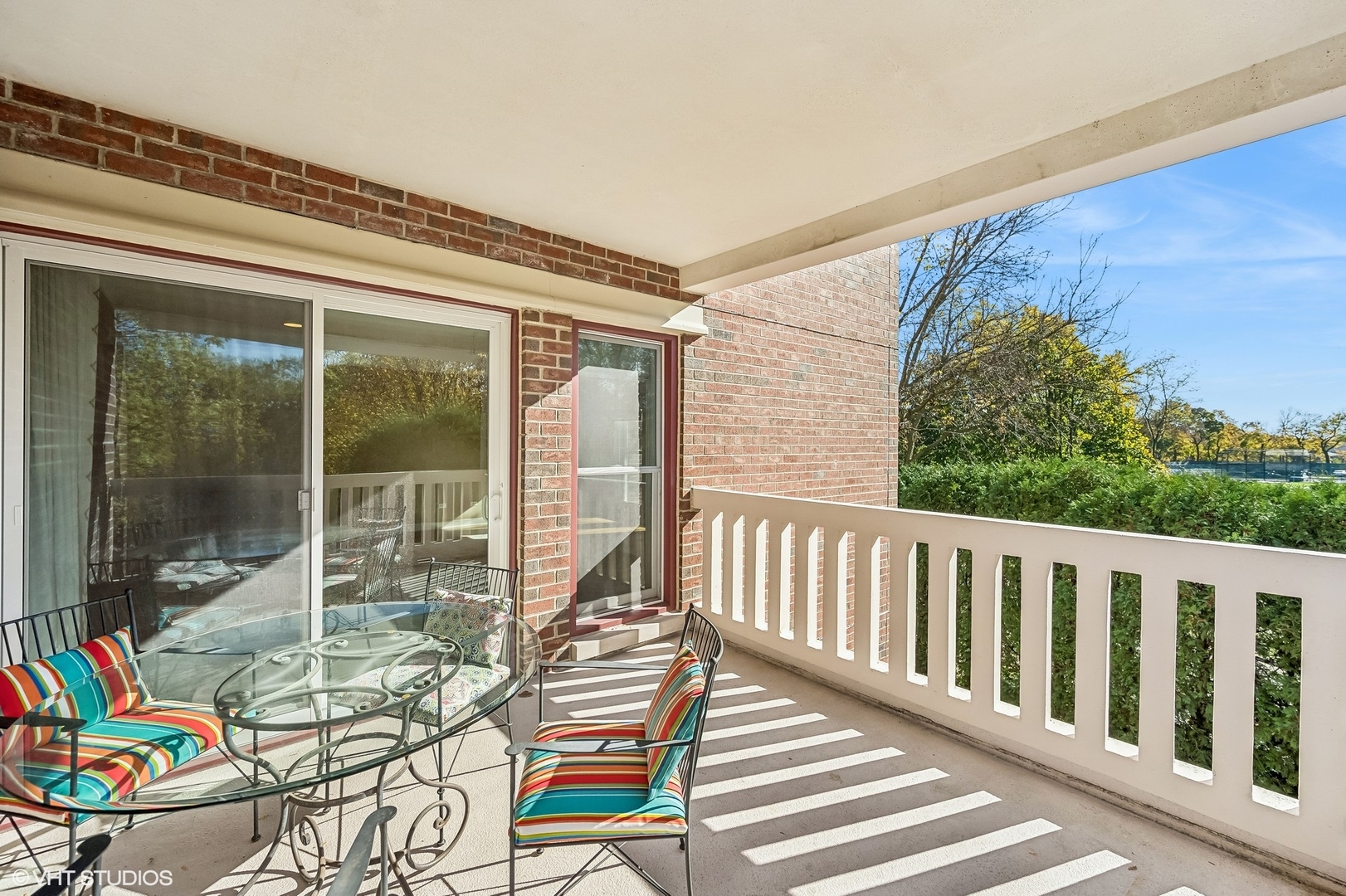 360 Green Bay Road, Unit 3D Winnetka, IL 60093 - Photo 18 of 30 a balcony with furniture and a potted plant