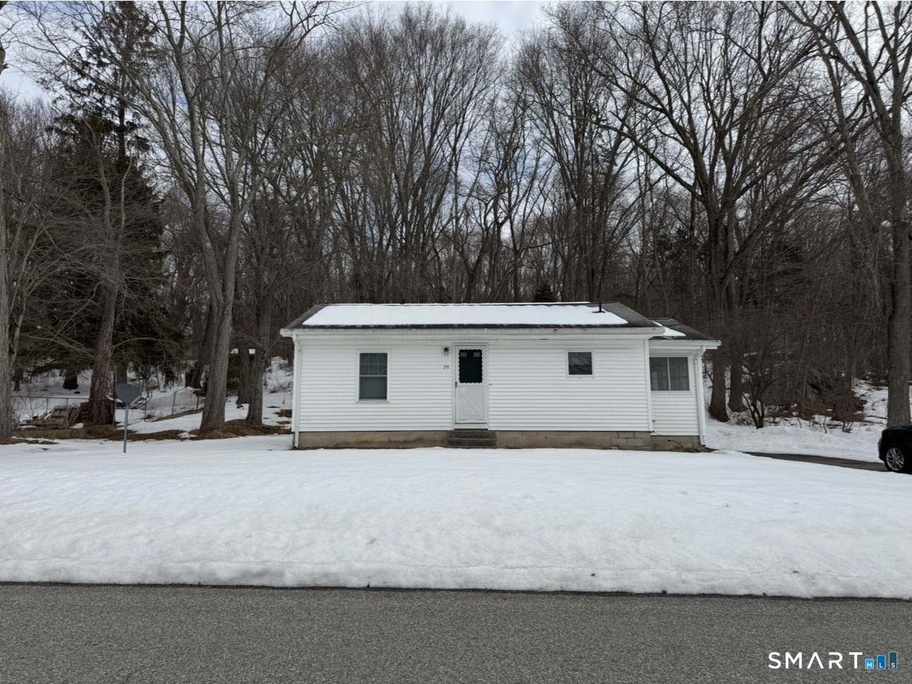 25 Wawecus Hill Road Norwich, CT 06360 - Photo 2 of 13 a white house that has a tree in front of it