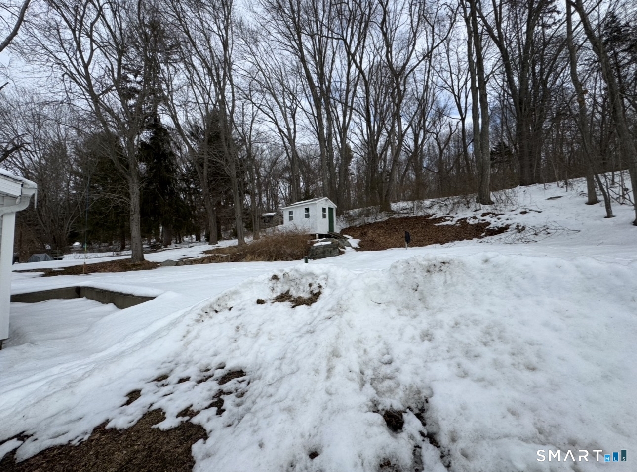 25 Wawecus Hill Road Norwich, CT 06360 - Photo 4 of 13 a view of road with snow on the road