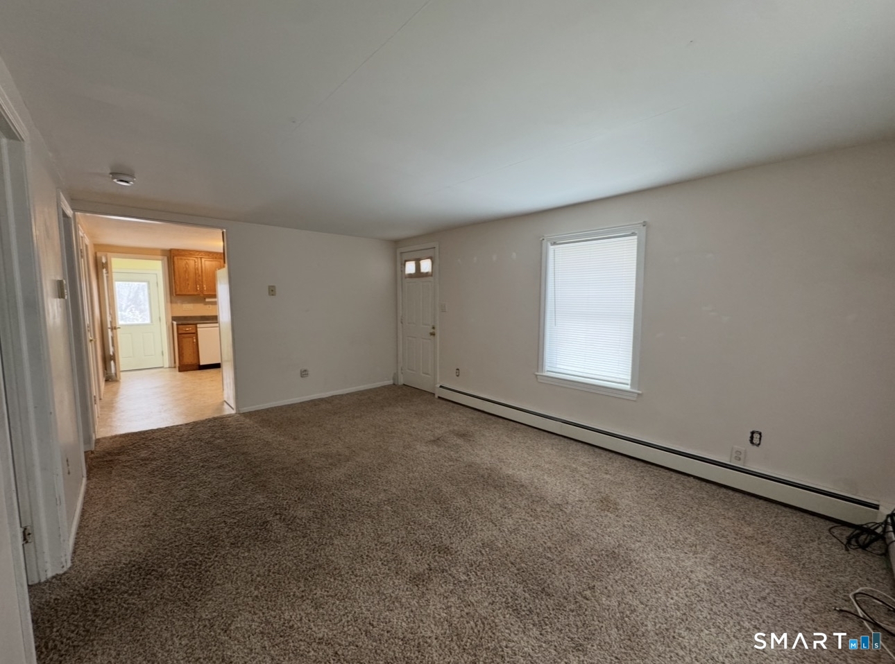 25 Wawecus Hill Road Norwich, CT 06360 - Photo 10 of 13 an empty room with a window