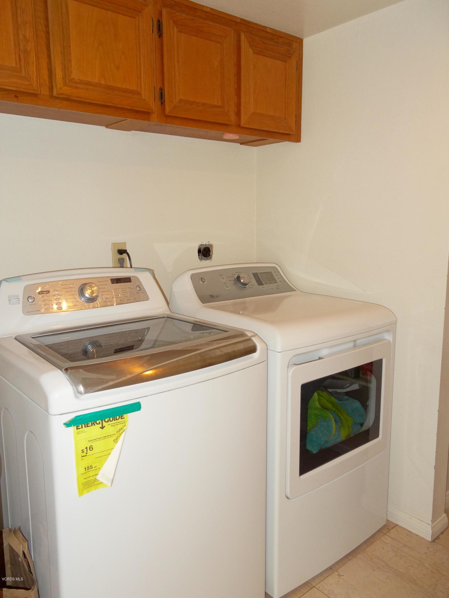 32 Valley Crest Road Simi Valley, CA 93065 - Photo 11 of 39 a utility room with dryer and washer