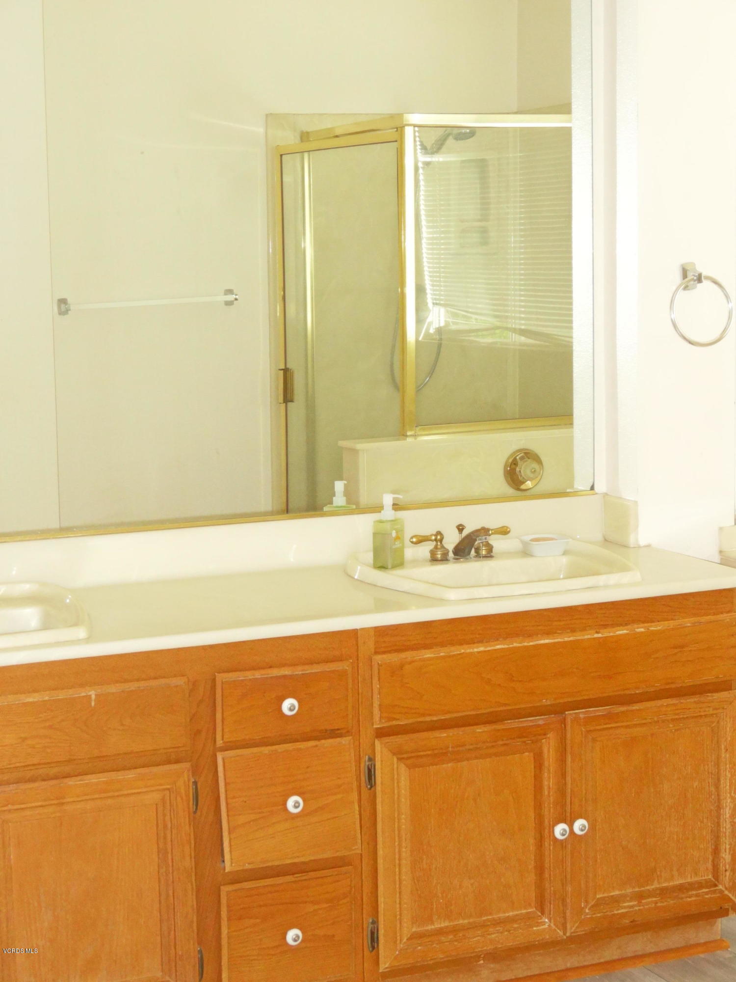 32 Valley Crest Road Simi Valley, CA 93065 - Photo 17 of 39 a bathroom with a sink and a mirror