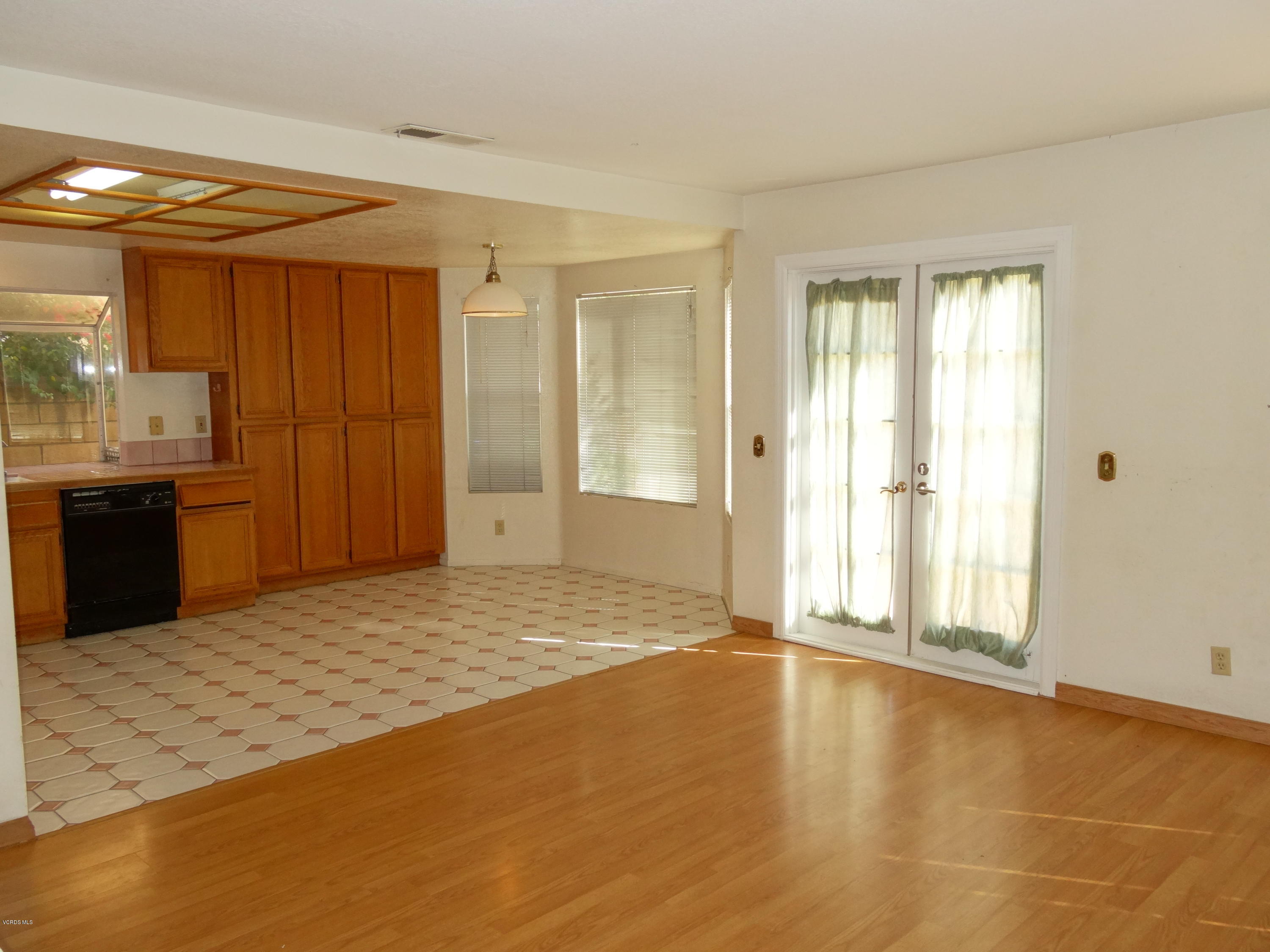 32 Valley Crest Road Simi Valley, CA 93065 - Photo 10 of 39 a view of an empty room with window and a kitchen