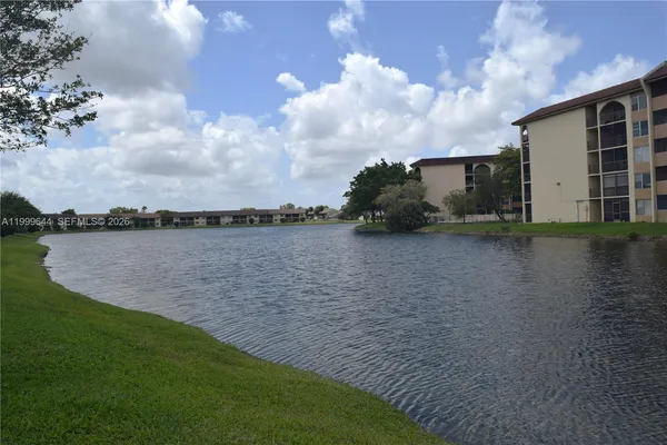 a view of a lake from a yard
