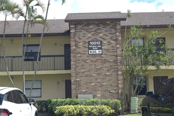 a view of a street with a park