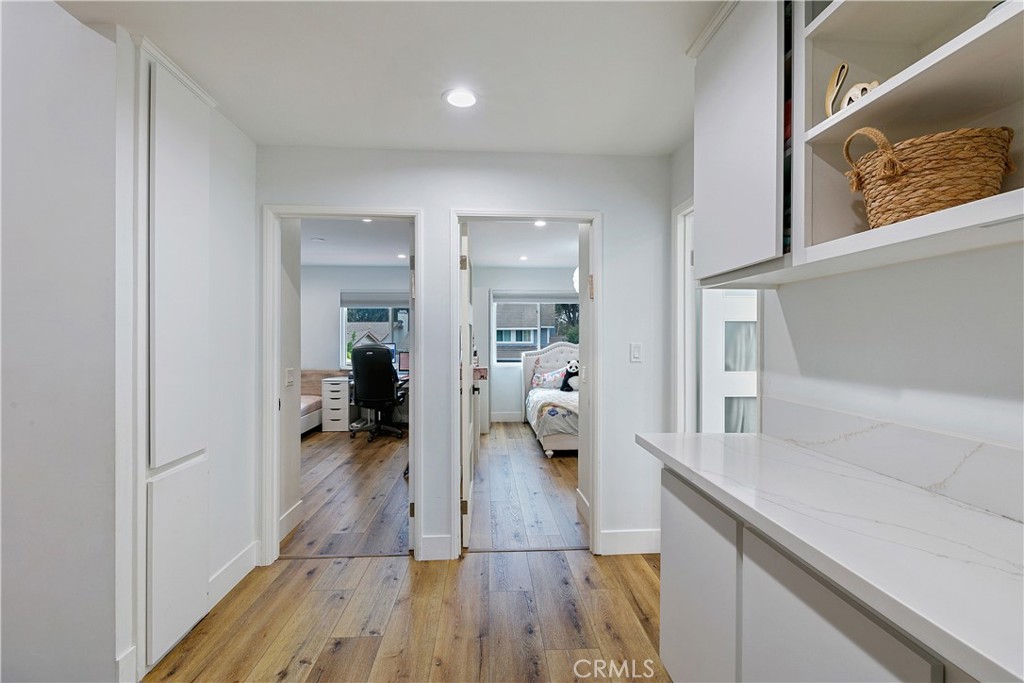 24411 Highlander Road West Hills, CA 91307 - Photo 23 of 58 a en suite bathroom with a sink and a wooden floor