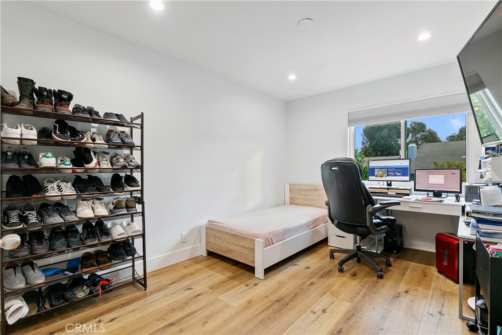 24411 Highlander Road West Hills, CA 91307 - Photo 28 of 58 a view of a workspace with furniture and a window