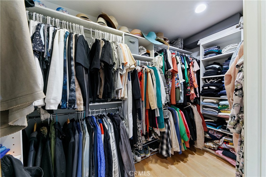 24411 Highlander Road West Hills, CA 91307 - Photo 34 of 58 a view of walk in closet with clothes