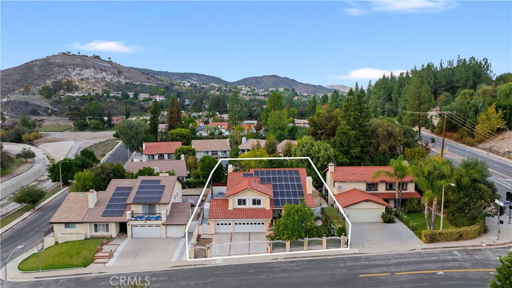 24411 Highlander Road West Hills, CA 91307 - Photo 48 of 58 an aerial view of a house with garden space and couple of houses