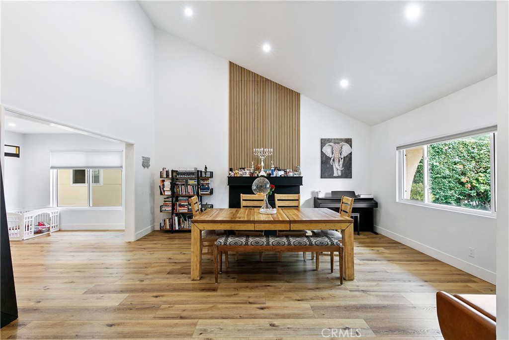 24411 Highlander Road West Hills, CA 91307 - Photo 5 of 58 a view of a dining room with furniture window and wooden floor