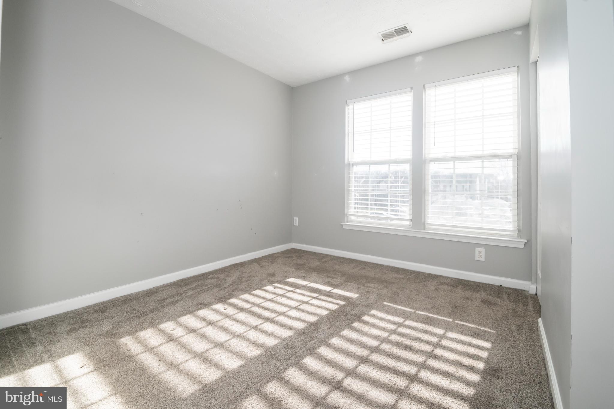 5224 Leavers Court Rosedale, MD 21237 - Photo 12 of 27 a view of an empty room and window