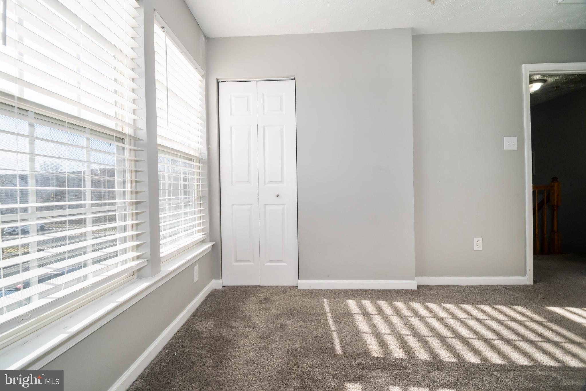5224 Leavers Court Rosedale, MD 21237 - Photo 13 of 27 a view of a bedroom with a large window