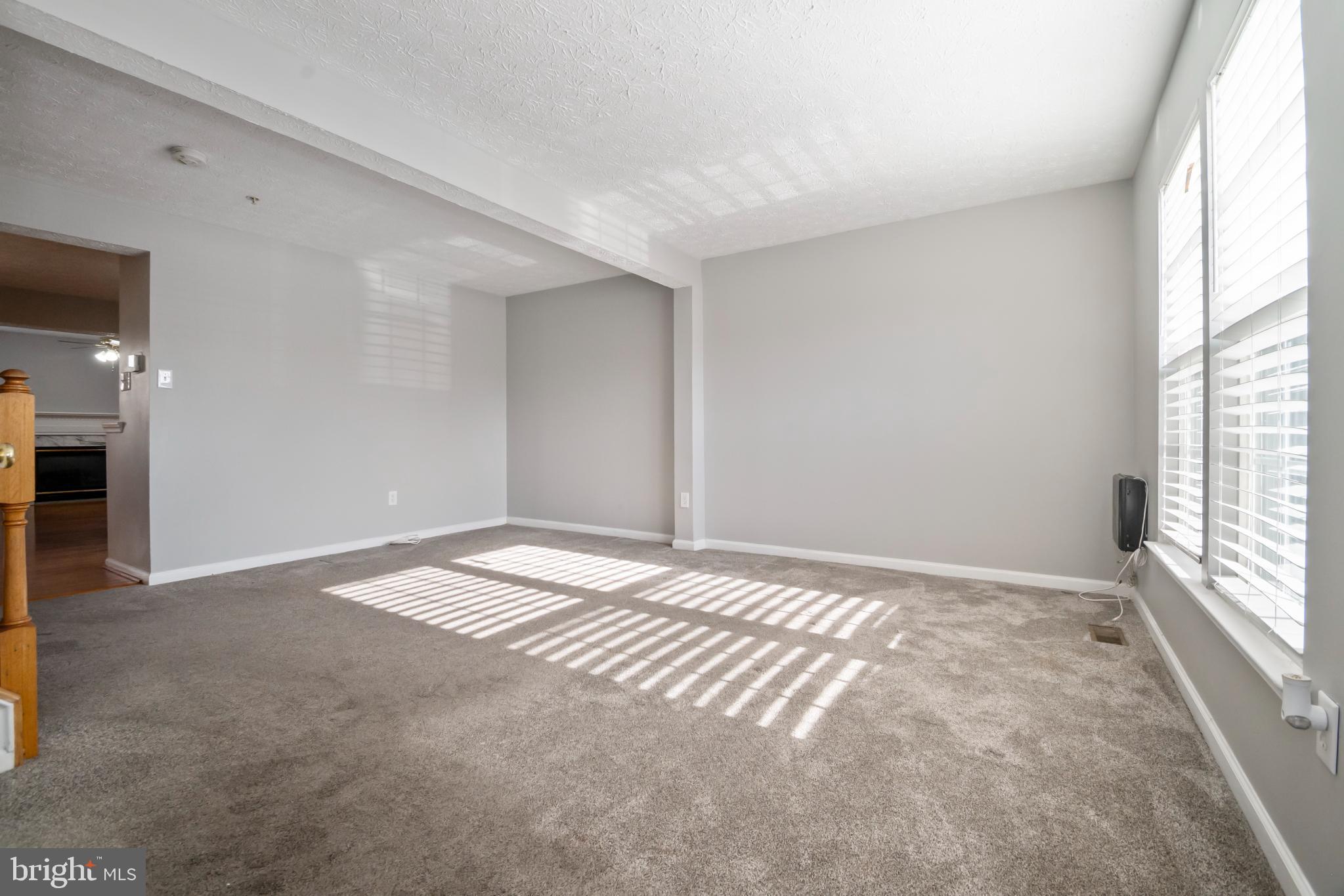 5224 Leavers Court Rosedale, MD 21237 - Photo 2 of 27 a view of an empty room and window