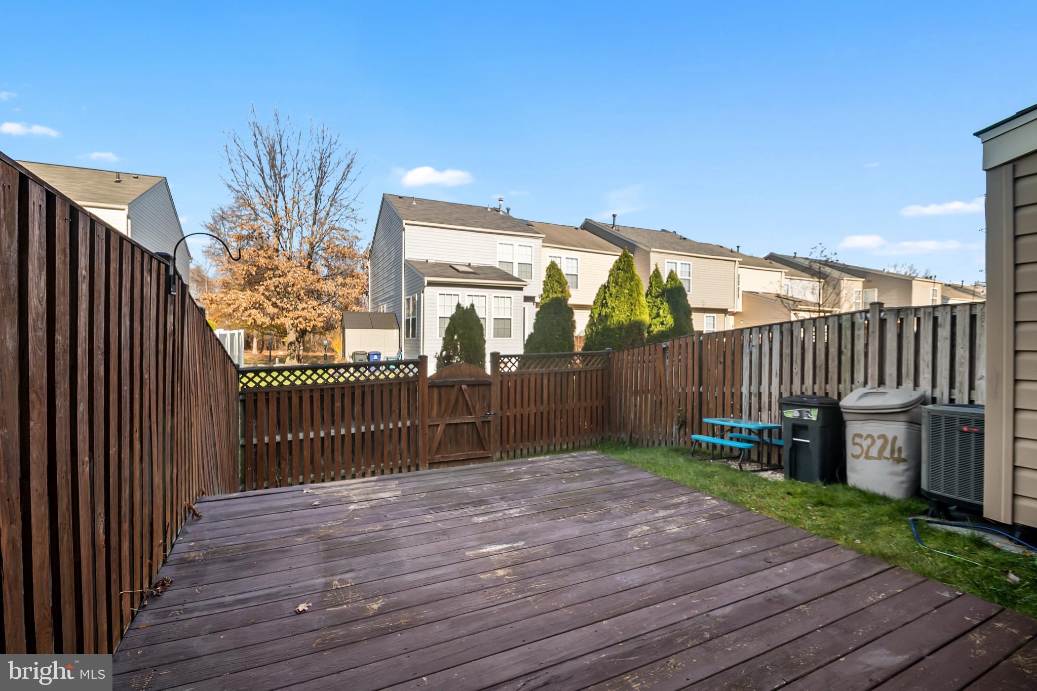 5224 Leavers Court Rosedale, MD 21237 - Photo 26 of 27 a view of a backyard with wooden fence
