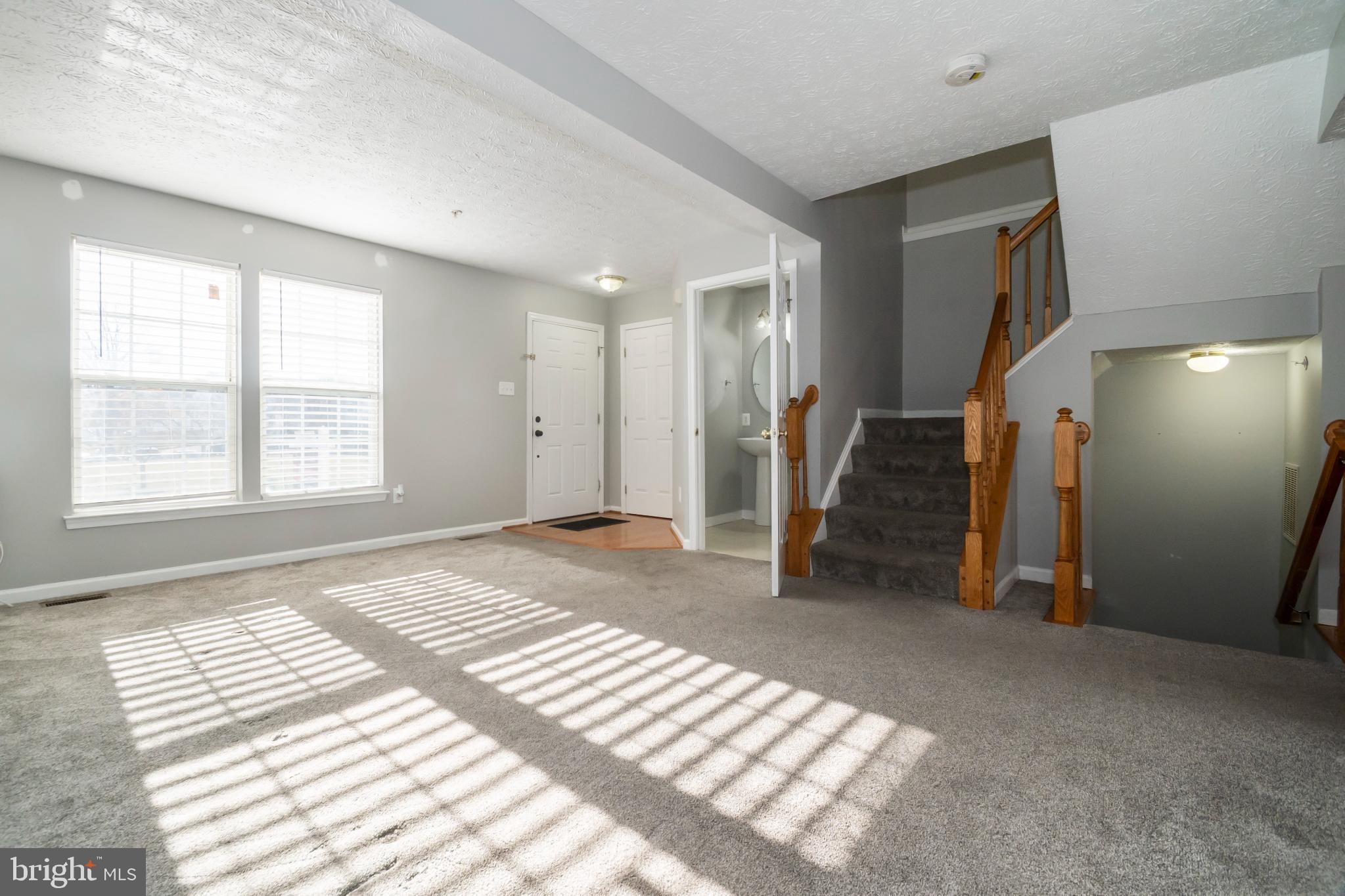 5224 Leavers Court Rosedale, MD 21237 - Photo 4 of 27 a view of a big room with a window