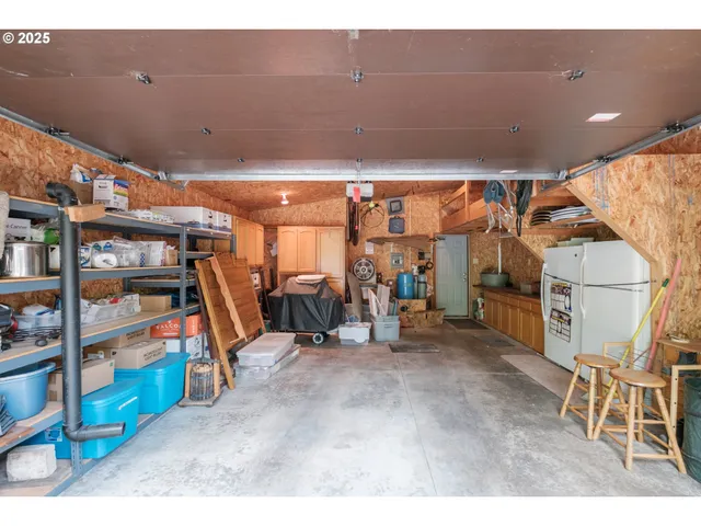 a room with furniture and a book shelf