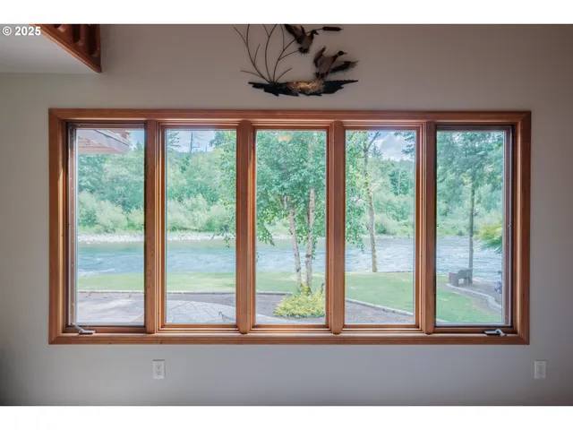 a kitchen with refrigerator cabinets and furniture