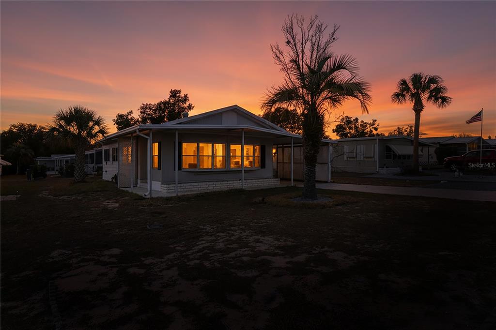 15071 Rialto Avenue Brooksville, FL 34613 - Photo 1 of 41 a front view of house with yard and green space