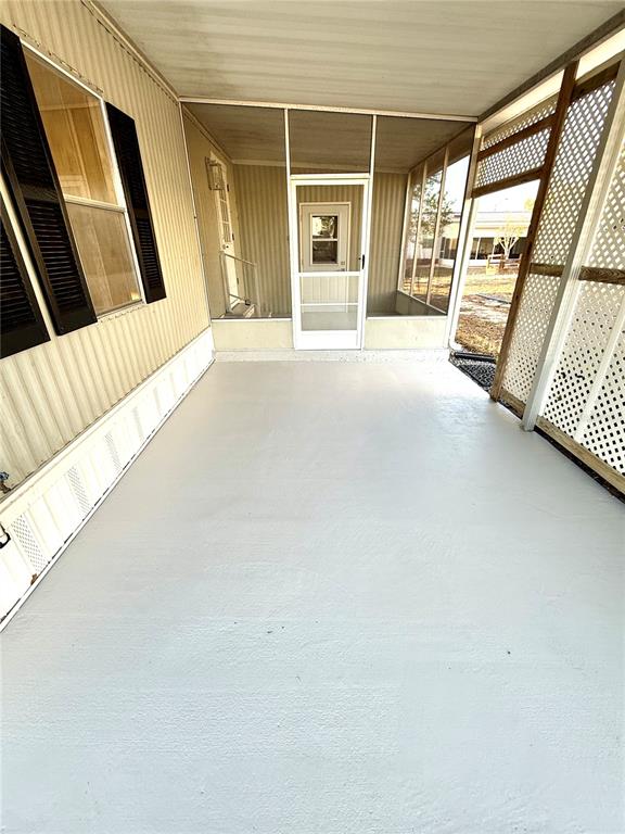 15071 Rialto Avenue Brooksville, FL 34613 - Photo 26 of 41 a view of an empty room with a window