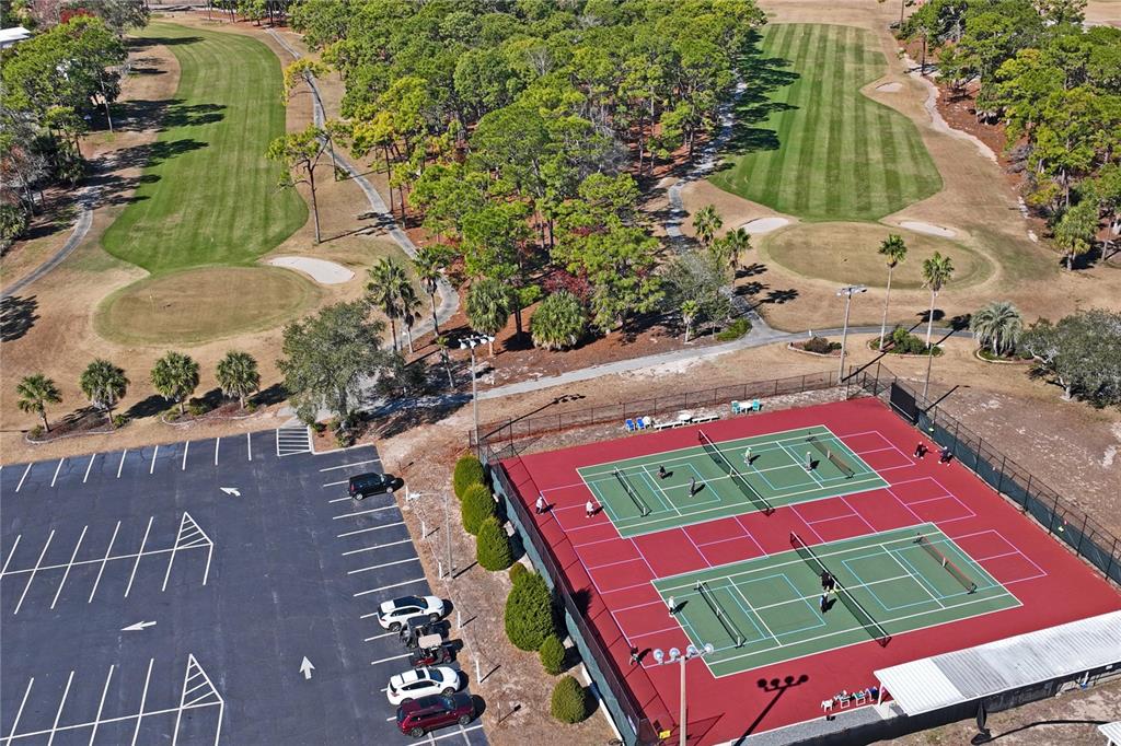 15071 Rialto Avenue Brooksville, FL 34613 - Photo 39 of 41 an aerial view of a tennis ground and a yard