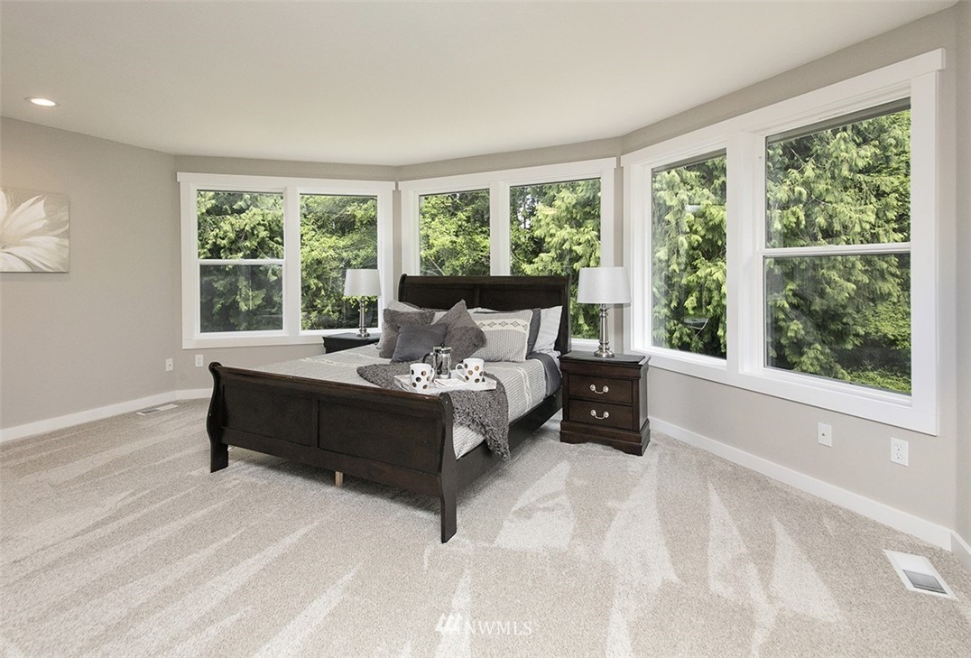 971 Sandy Point Road Langley, WA 98260 - Photo 14 of 25 a living room with furniture and a large window