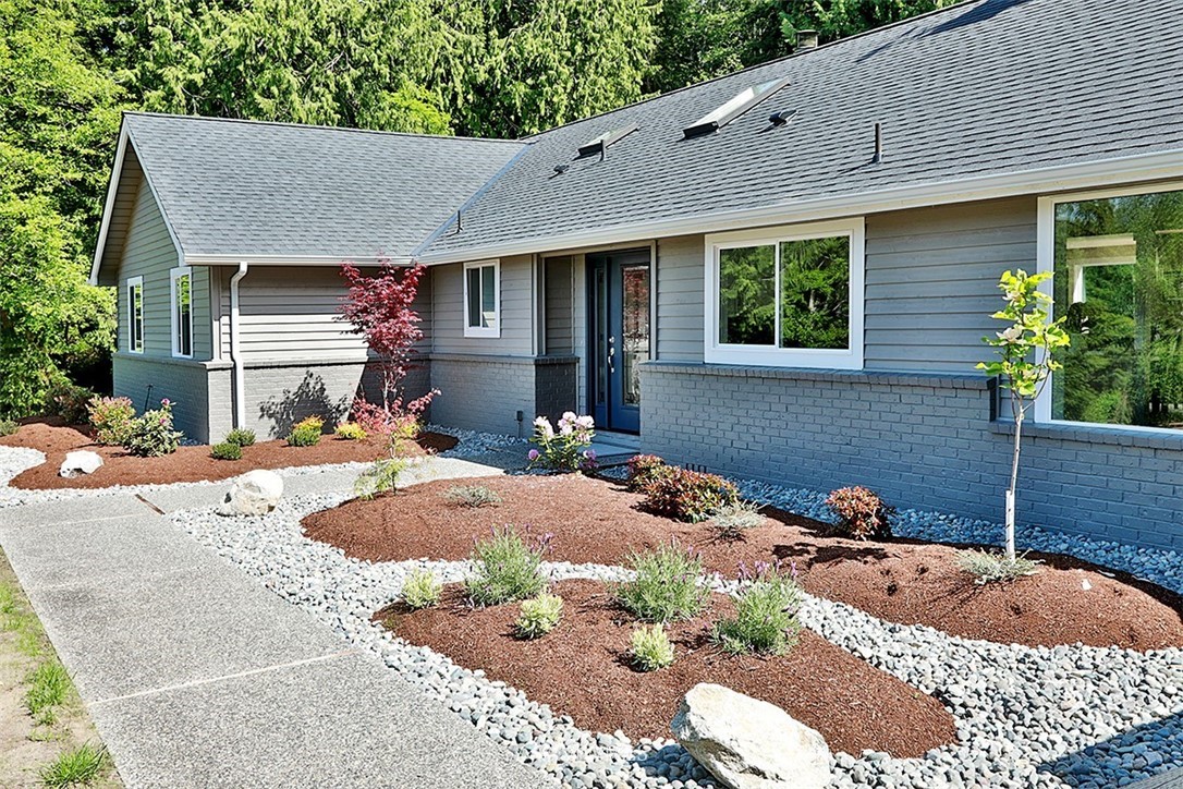 971 Sandy Point Road Langley, WA 98260 - Photo 21 of 25 a front view of a house with a yard