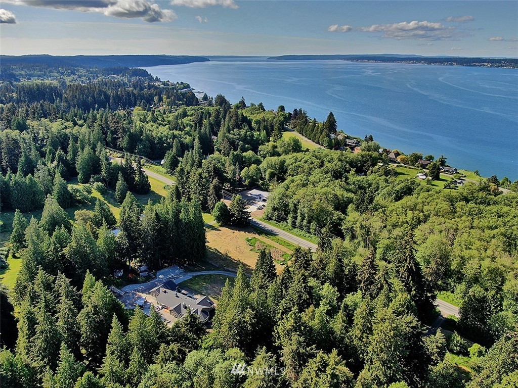 971 Sandy Point Road Langley, WA 98260 - Photo 25 of 25 an aerial view of a house with a yard