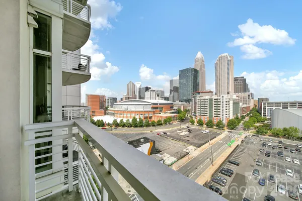 a view of a balcony with city view