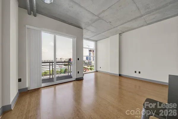 a kitchen with stainless steel appliances a refrigerator and a stove