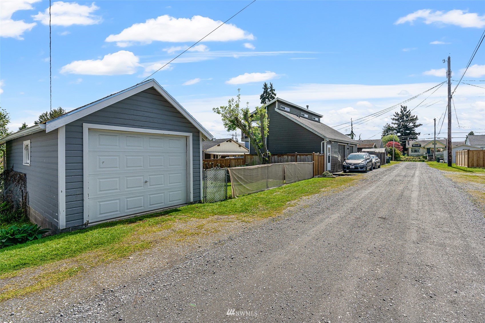 1818 Maple Street Everett, WA 98201 - Photo 27 of 37 a view of a house with a backyard