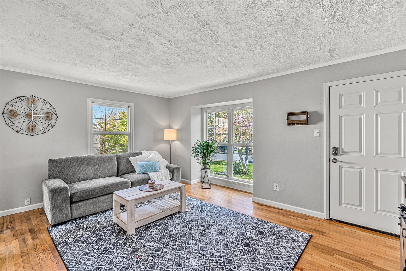 1818 Maple Street Everett, WA 98201 - Photo 6 of 37 a living room with furniture and a rug