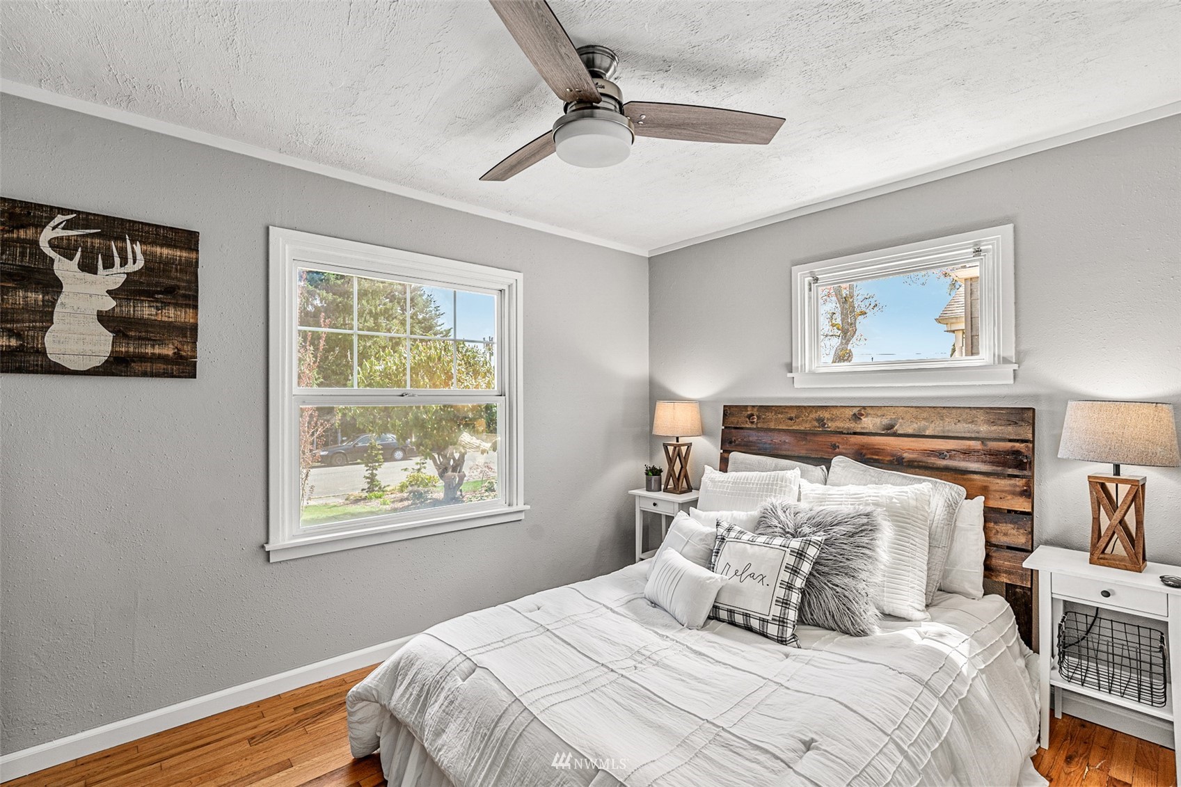 1818 Maple Street Everett, WA 98201 - Photo 8 of 37 a bedroom with a bed and a window