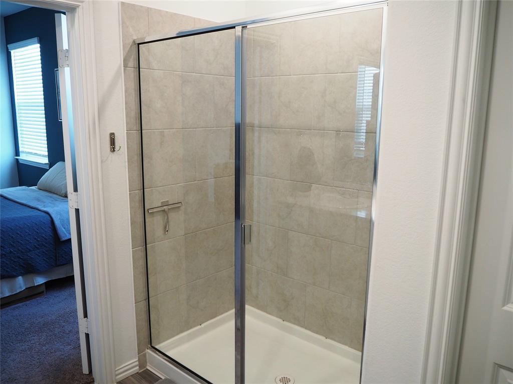 1116 Mesquite Lane Princeton, TX 75407 - Photo 16 of 28 a bathroom with a shower