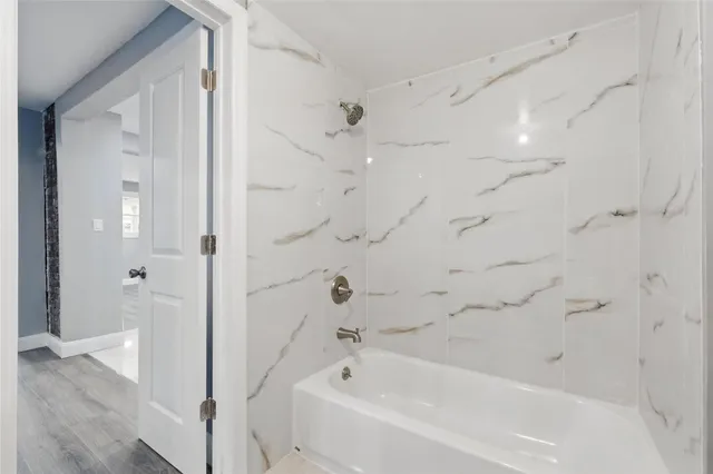 a bathroom with a bathtub