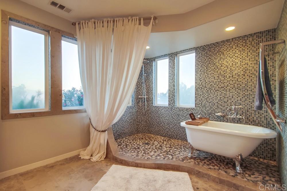 670 Georgine Road Fallbrook, CA 92028 - Photo 16 of 25 You can enjoy those views from your custom tiled master shower or soak the day away in your claw foot tub
