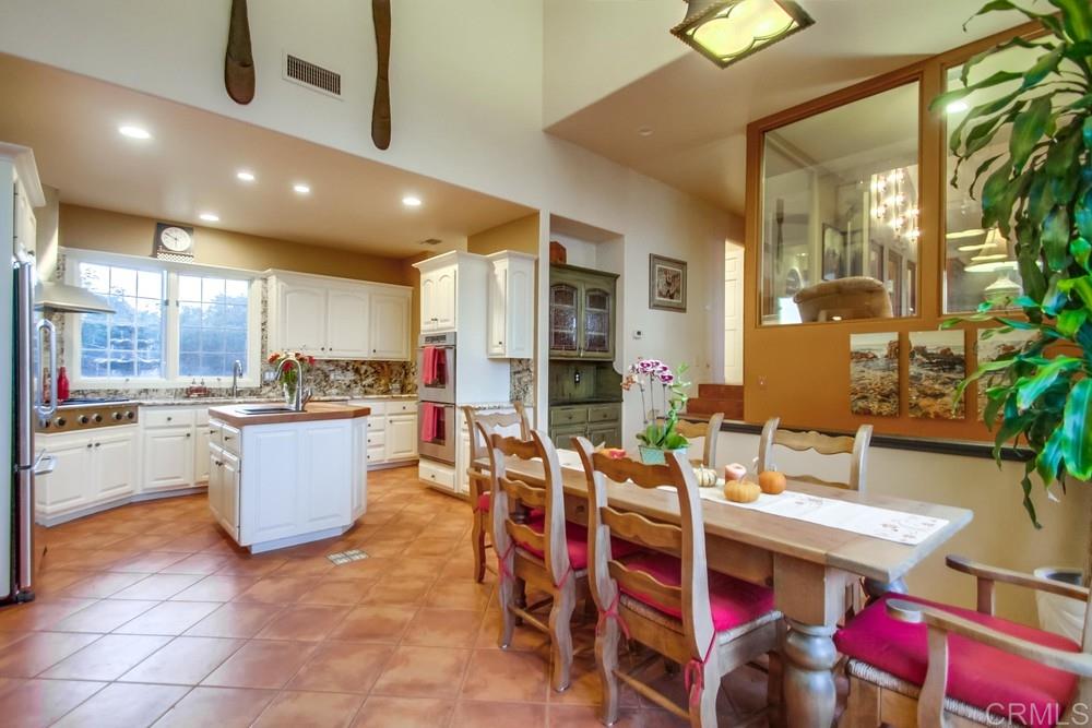 670 Georgine Road Fallbrook, CA 92028 - Photo 6 of 25 Gourmet Kitchen with Granite Counters and Dacor Stainless Steel appliances