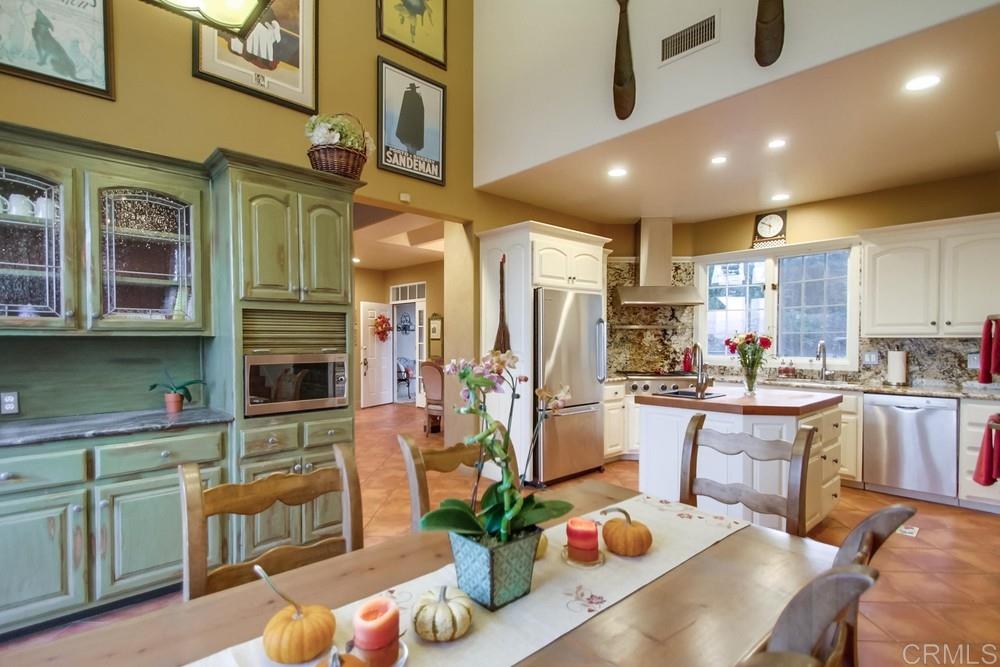 670 Georgine Road Fallbrook, CA 92028 - Photo 7 of 25 Plenty of cabinets, counters and kitchen island perfect for everyday cooking as well as entertaining