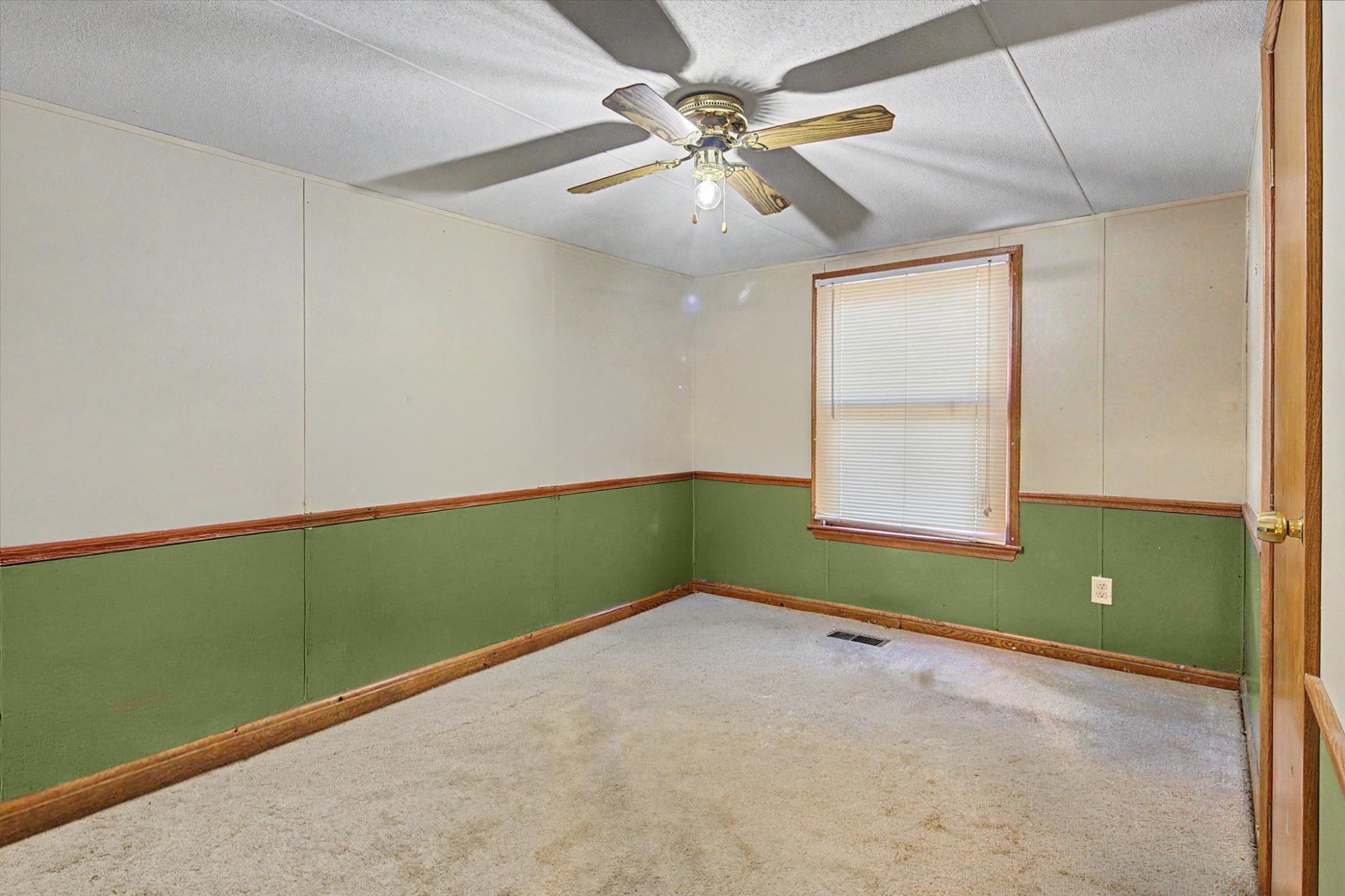 16 Ray Drive Denver, PA 17517 - Photo 15 of 20 an empty room with ceiling fan and window