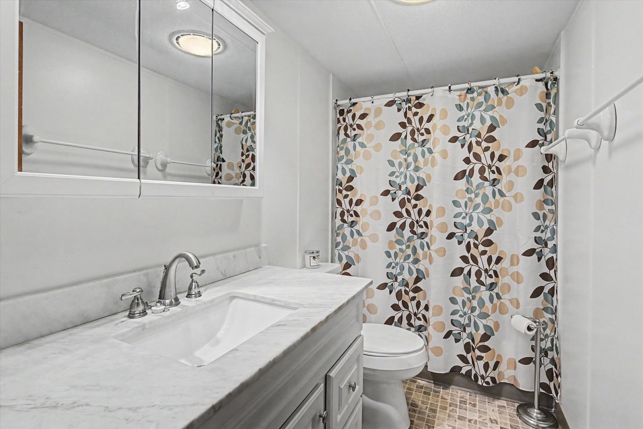 16 Ray Drive Denver, PA 17517 - Photo 16 of 20 a bathroom with a sink and a toilet